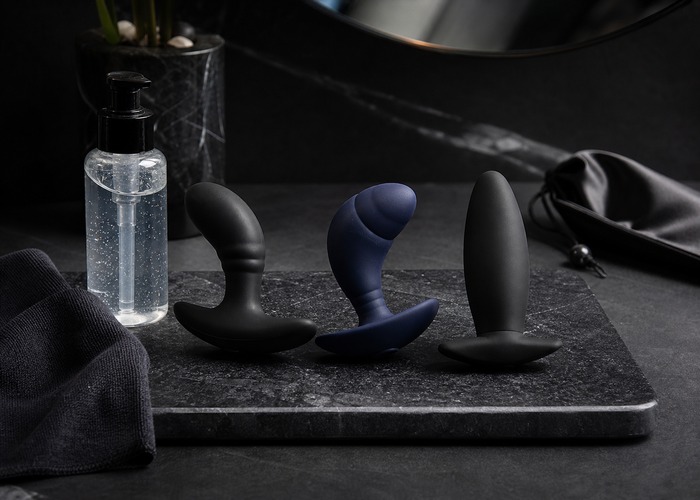 Anal Vibrators guide product scene with anal vibrator, flared base, water-based lube