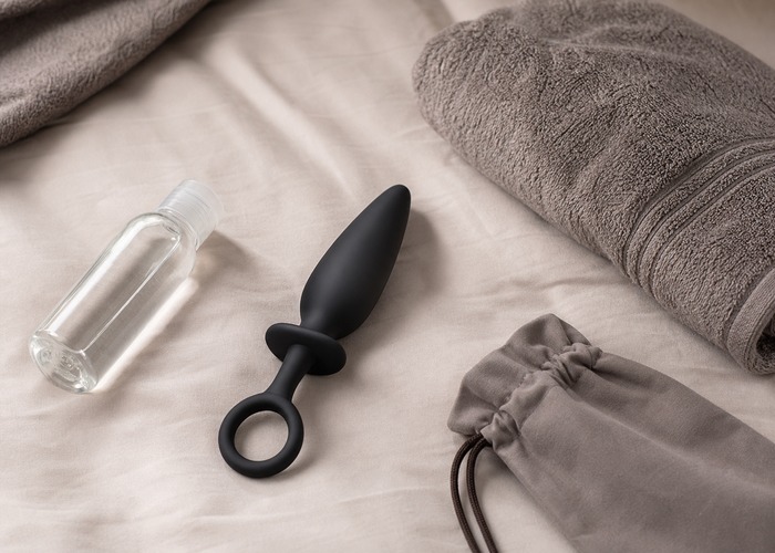 Anal Vibrators guide product scene with tapered silicone body, retrieval loop, water-based lube