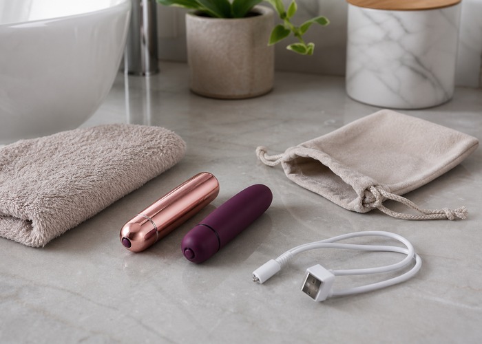 Bullet Vibrators guide product scene with bullet vibrator, water-based lube, soft towel