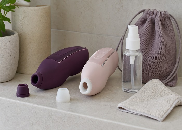 Clitoral Suction Vibrators guide product scene with soft rim suction toy, firmer shell suction toy, toy cleaner