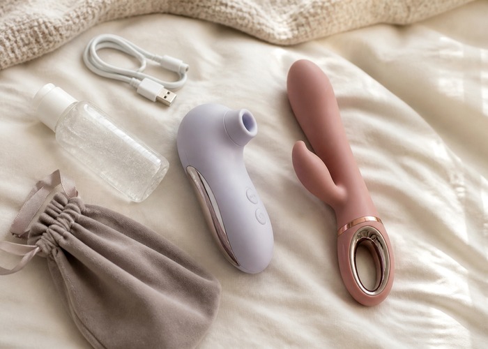 New Arrival Toys guide product scene with boxed toy, charging cable, folded note card