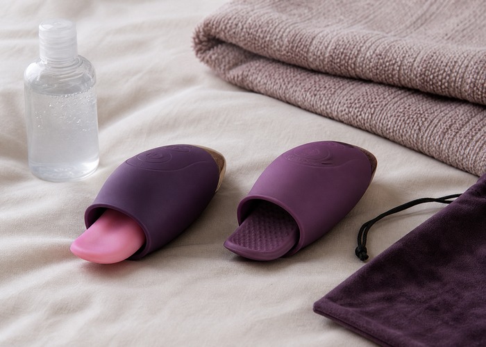 Tongue Vibrators guide product scene with tongue vibrator, soft flap tip, water-based lube